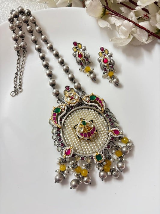 Kolhapuri dualtone necklace with kundan fusion and hook earrings