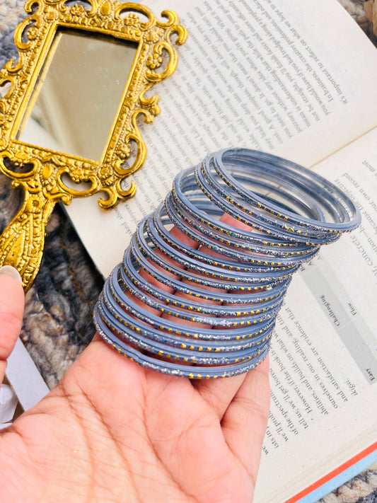 Set of 24 Stylish Grey Glass Bangles with Golden Detailing