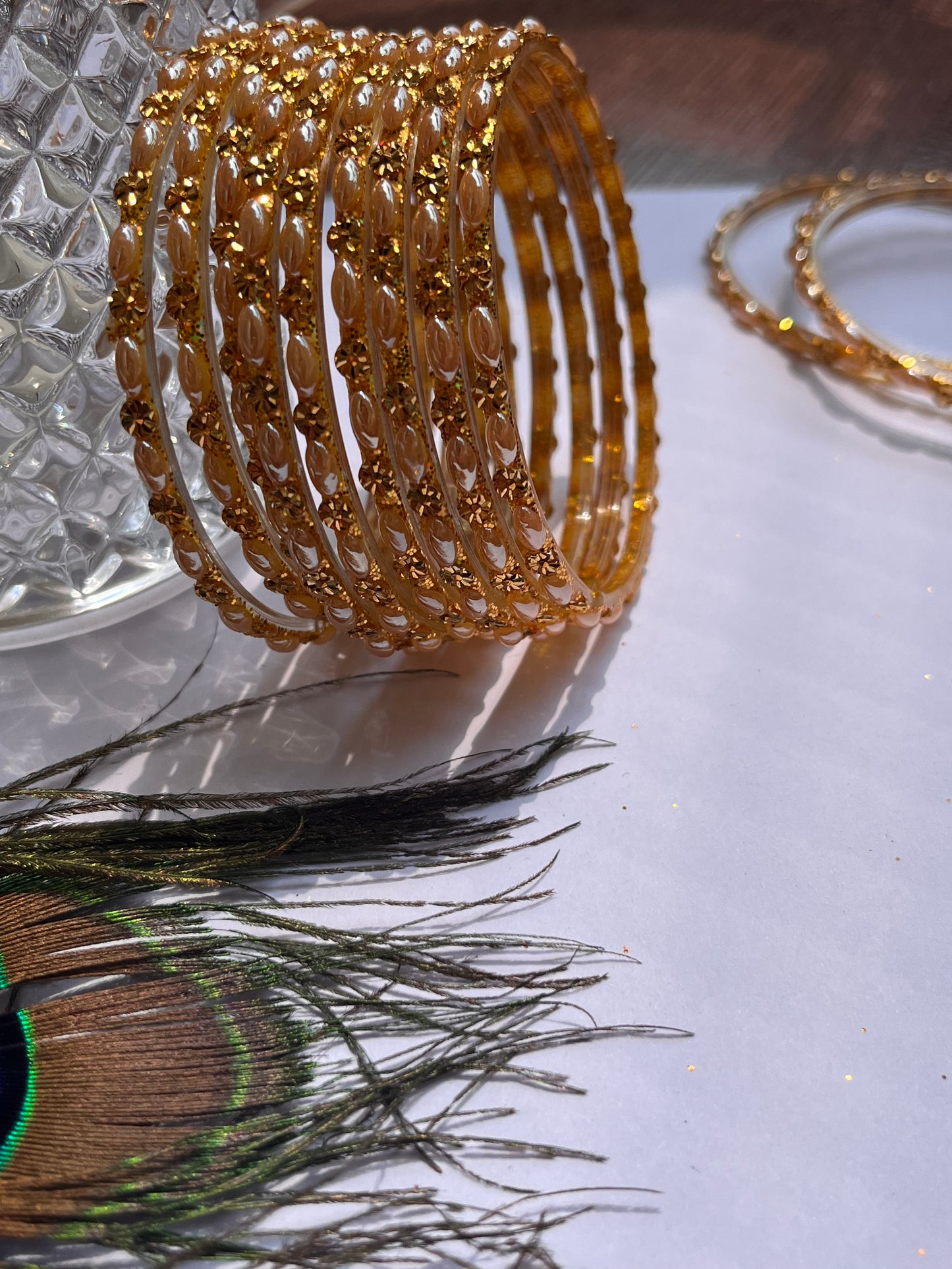 Set of 12 Golden Glass Bangles with Floral Detailing (Set of 12 )